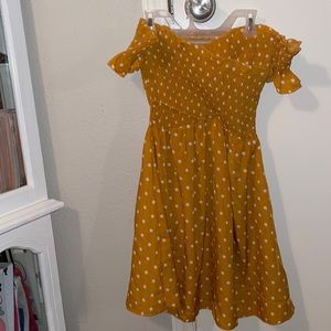 Mustard yellow and white polka dot cross over dress
